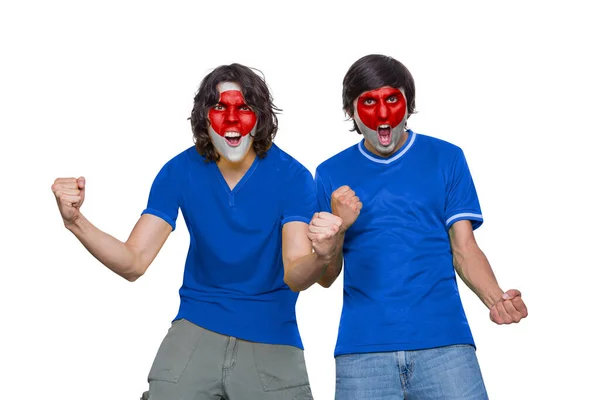 两名身穿球衣的足球迷 脸上涂着日本队的旗帜 激动地尖叫着 背景是白色的 — 图库照片
