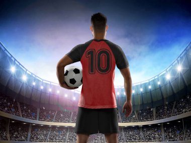 Belçika milli takımının kırmızı ve siyah formasını giyen profesyonel erkek futbolcu 10 numaralı formayla taraftarlarla dolu bir maç için stadyuma giriyor..