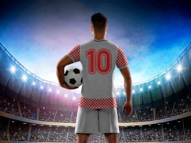 Hırvatistan milli takımı forması giyen profesyonel erkek futbolcu 10 numaralı formayla taraftarlarla dolu stadyuma maç için giriyor..