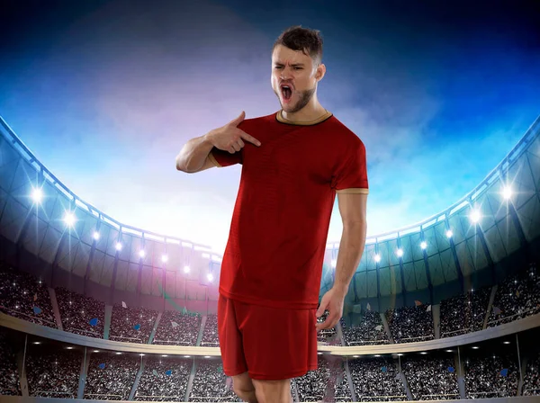 塞尔维亚职业足球运动员 手拿球手拿球 带着挑战的表情 在足球场上众目睽睽 — 图库照片
