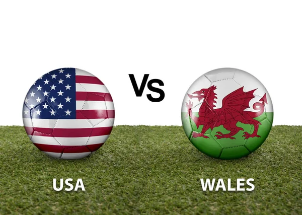 Two balls with the flags of rival countries USA vs Wales on the grass of a Qatar 2022 world cup soccer field on a white background.