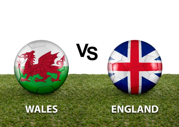 ライバル国の旗を持つ2つのボール白を背景にカタール2022ワールドカップサッカー場の芝生の上にウェールズ対イングランド — ストック写真