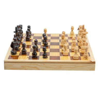Traditional handmade wooden chess board with black and natural colored chips on a white background.