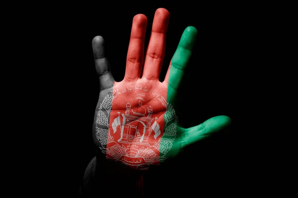 Rude man hand with flag of AFGHANISTAN in stop sign to anger, discrimination, racism, abuse on black background.