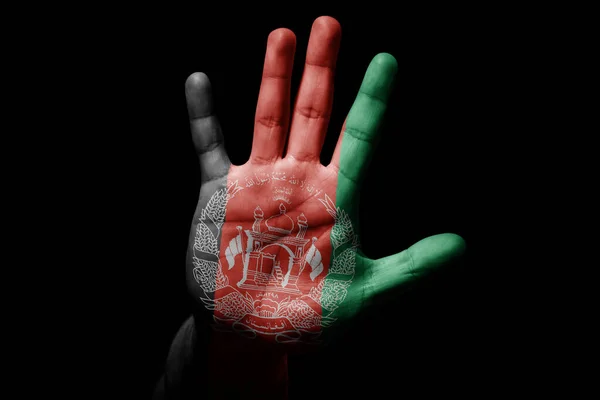 Rude man hand with flag of AFGHANISTAN in stop sign to anger, discrimination, racism, abuse on black background.