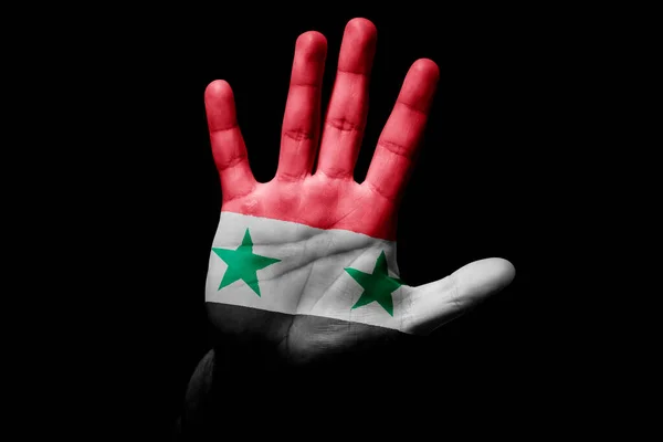Rude man hand with flag of Syria in stop sign to anger, discrimination, racism, abuse on black background.
