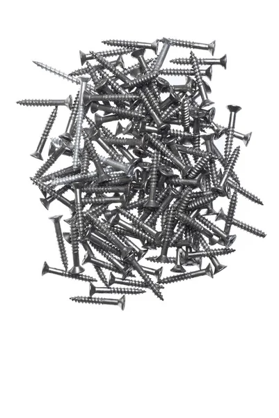 白色底座钢结构螺丝堆 — 图库照片