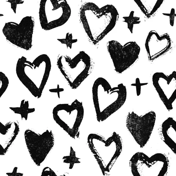 Seamless hand drawn heart pattern, black on white background. Artwork for printing, fabric, textile, manufacturing, wallpapers, wrapping paper, greeting card.