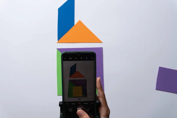 Puzzle game for children made with colored cardboard.