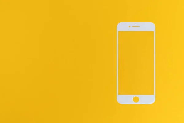 White screen for phone, screen replacement on yellow isolated background. the concept of repair and maintenance of mobile devices