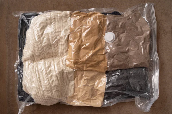 Close Compressed Transparent Bag Winter Clothes Seasonal Storage Space Saving — Stock Photo, Image
