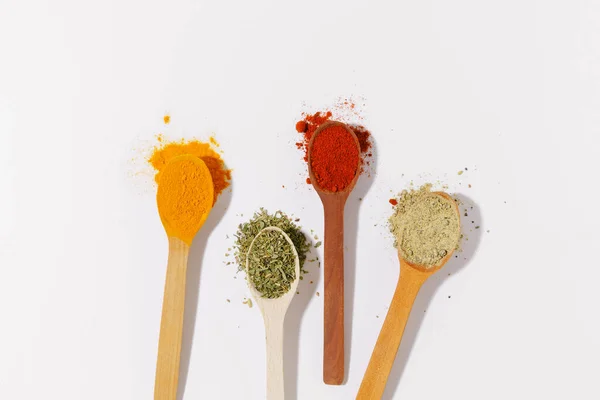 Aromatic Spices Turmeric Dried Basil Paprika Garlic Wooden Spoons White — Stock Photo, Image