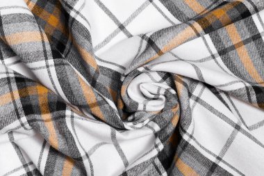 Beyaz, sarı ve siyah ekose kumaşın bükülmüş dokusu. Tasarımın için arka plan. Geleneksel İskoç kıyafeti ve tarzı