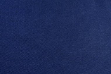 Twill 'in yakın dokusu ve mavi renkli polyester kumaş. Dikiş için kumaş konsepti. Tasarımın için resim