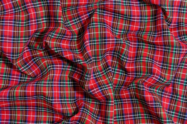 Geleneksel İskoç tartan renklerinde buruşuk, buruşuk kumaş dokusu. Model veya tasarımın için arkaplan