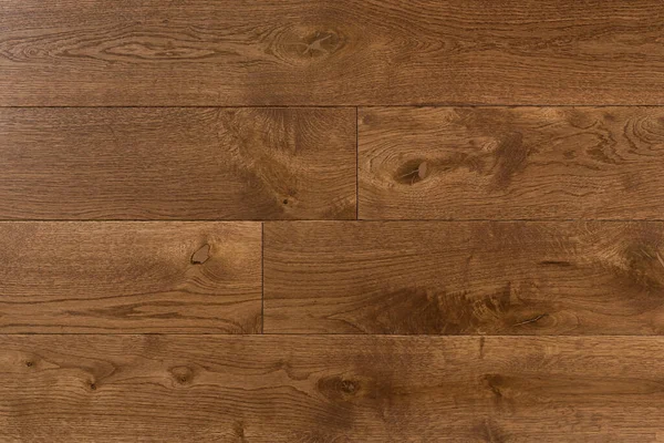 Doğal kahverengi meşe parke dokusu. Parlatılmış kaplama için tahta tahtalar. Ahşap arkaplan