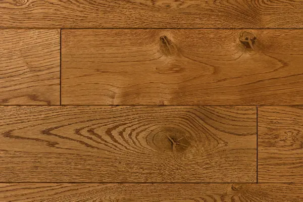 Doğal meşe parke dokusu yakından. Parlatılmış kaplama için tahta tahtalar. Ahşap örnekleme arka planı
