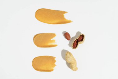 Fıstık ezmesi, kabuklu fındık ve besleyici gıda konsepti. Tasarımın için resim