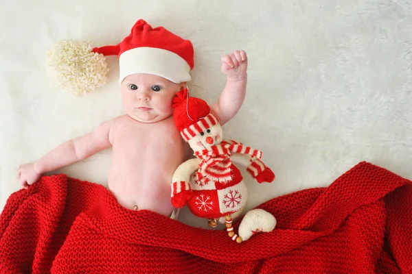 Cute Baby Santa Hat Big Bubo Covered Red Knitted Blanket — Stock Photo, Image