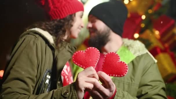 Couple Lovers Man Woman Kiss Hold Hands Two Red Hearts — Stock Video