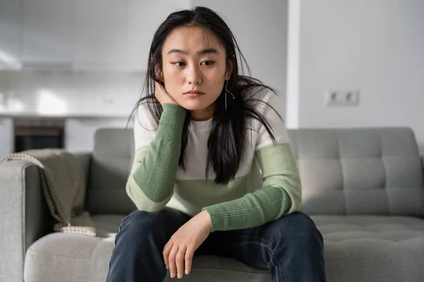 Sad Lonely Young Asian Woman Having Depression Symptoms Sitting Sofa — Stok fotoğraf