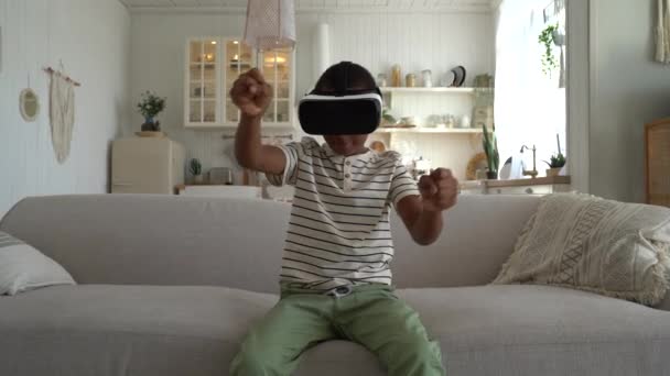 Little Enthusiastic African American Boy Use Helmet Video Games Sits — Stockvideo
