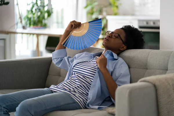 Tired Exhausted African American Woman Sits Sofa Home Using Paper — Photo