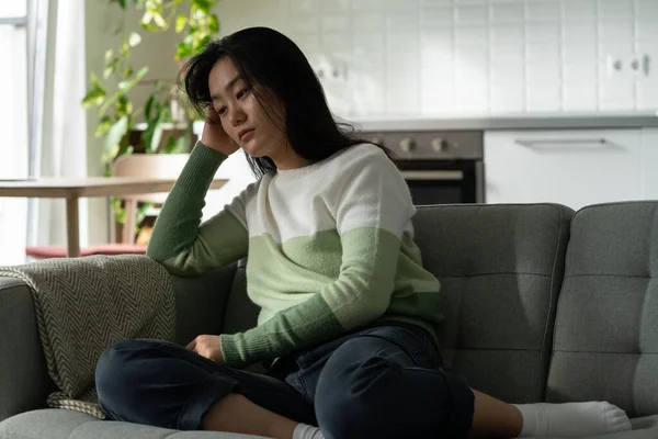 Anxious Asian Millennial Girl Sitting Sofa Feeling Lonely Suffering Monophobia — Stock Photo, Image