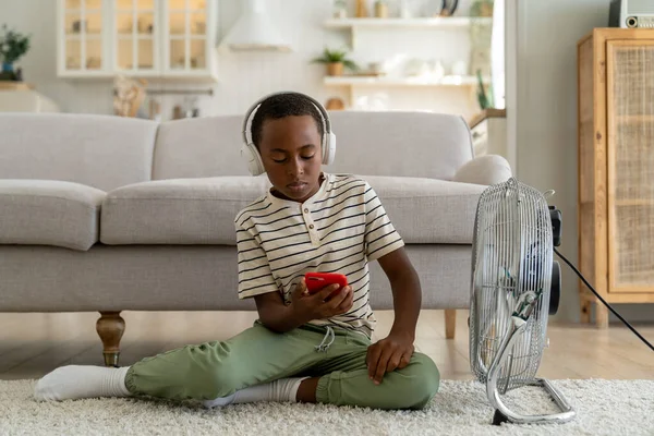 Interested African American Child Boy Sit Smartphone Headphones Floor Pleasure — Stock Photo, Image