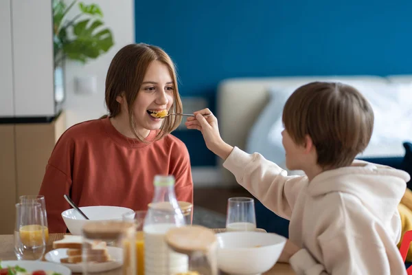 Happy Kids Siblings Having Fun Together Eating Cereals Morning Sitting — Stock Photo, Image