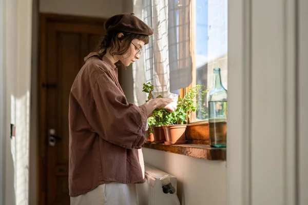 Hipster Girl Examining Leaves House Plant Standing Window Home Visually — Stock Photo, Image