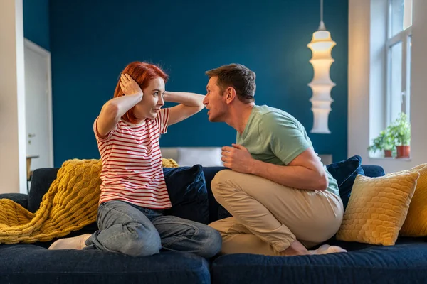 Tyrant Husband Shouting Wife Sitting Couch Home Looking Her Face — Stock Photo, Image