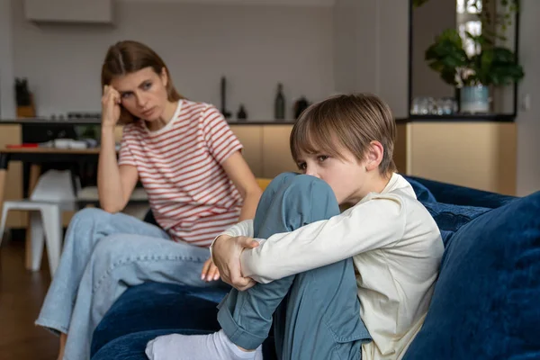 Frustrated Teenage Boy Sits Hugging Knees Couch Looks Away Argument — Stock Photo, Image