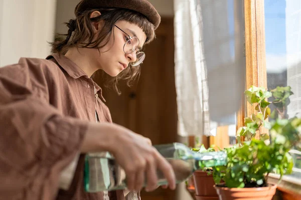 Plant Care Home Focused Hipster Girl Watering Houseplants Sunny Day — Stock Photo, Image