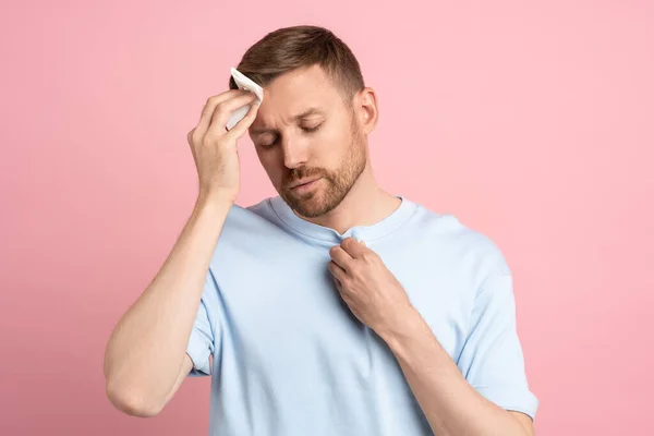Man Suffering Heat Stuffiness Wiping Sweat Forehead Paper Napkin Isolated — Stock Photo, Image