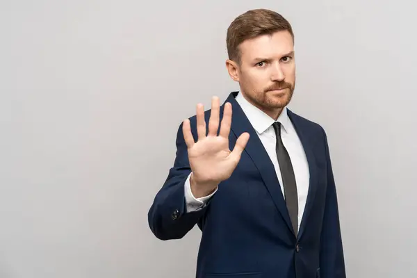 Serious Businessman Showing Stop Hand Gesture Grey Background Copy Space — Stock Photo, Image