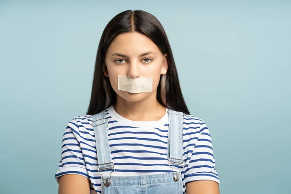 Unhappy Teenage Girl Closed Mouth Sealed White Tape Isolated Studio — Stock Photo, Image