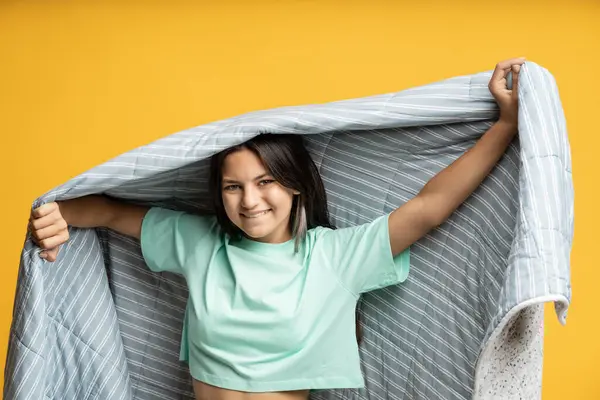 Smiling Teenage Girl Blanket Isolated Studio Yellow Wall Happy Joyful — Stock Photo, Image