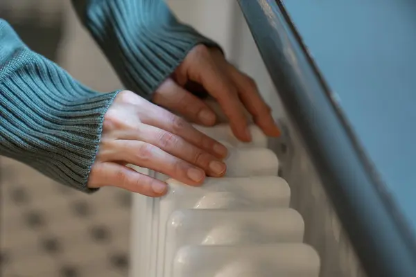 Cropped Photo Woman Warming Hands Radiator Home Female Warm Sweater — Stock Photo, Image