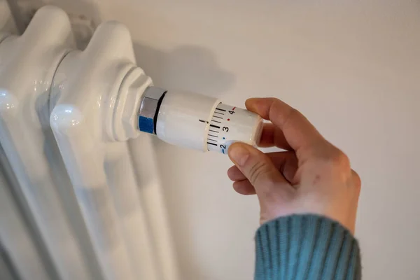 Hand Adjusting Heater Knob Regulating Temperature Home Winter Heating Season — Stock Photo, Image