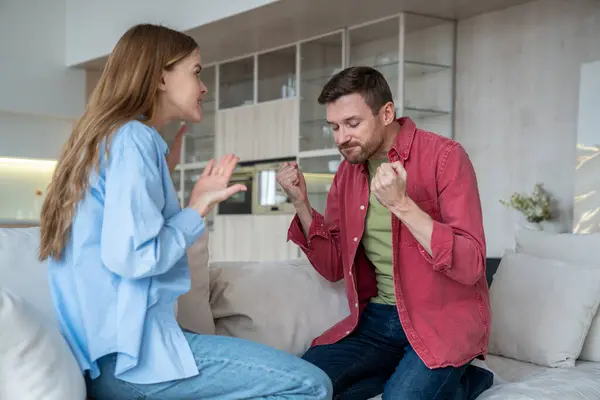 Emotional Wife Blaming Shouting Irritated Husband Trying Keep Emotions Calm — Stock Photo, Image
