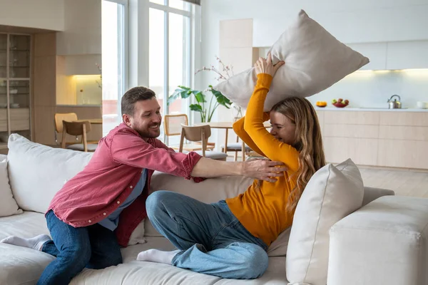 Playful Joyful Husband Tickling Sensitive Glad Wife Laughing Female Fighting — Stock Photo, Image