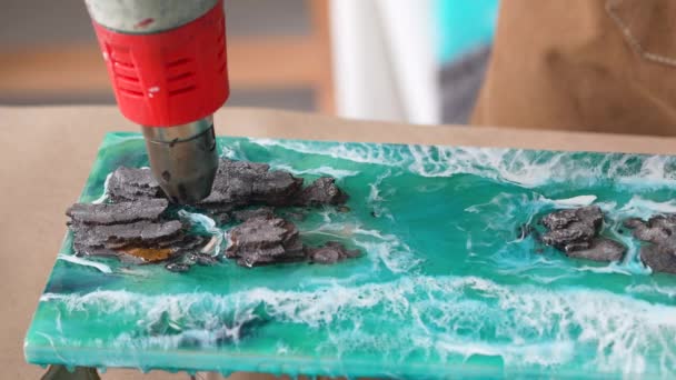 Artist Working Liquid Epoxy Resin Creating Sea Waves Rocks Two — Stock Video
