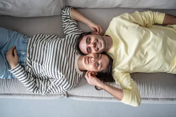 Happy Relaxed Young Couple Lying Sofa Smiling Joyful Guy Girl Images De Stock Libres De Droits