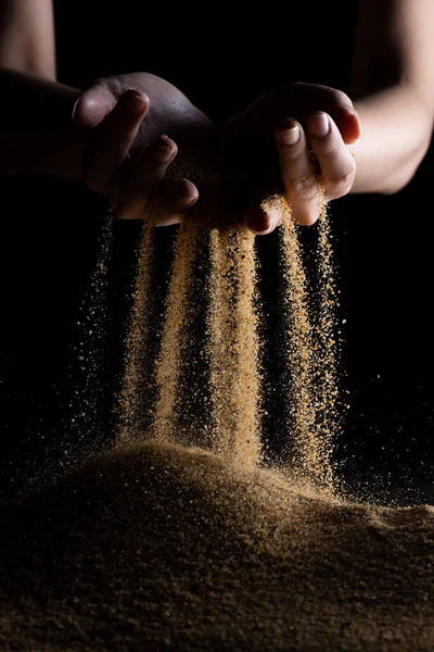 Hand Releasing Dropping Sand Fine Sand Flowing Pouring Fingers Black — Stock Photo, Image