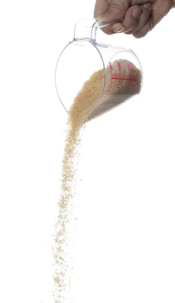 Kahverengi Şeker Düşüyor Kahverengi Tahıl Şekeri Ölçü Kabından Soyut Bulut — Stok fotoğraf