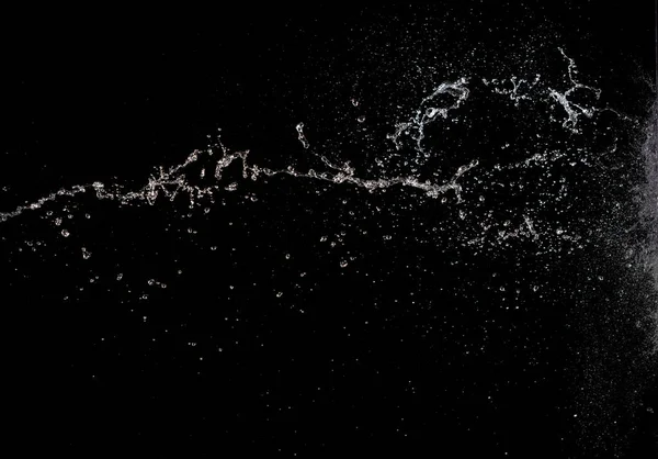 形状形成的水花飞溅成落水攻击 在空中飞舞 停止运动冻结射击 喷水用于爆炸纹理图形资源元素 黑色背景隔离 — 图库照片