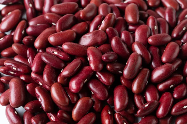 Macro Close up Texture of red bean, red grain beans. Beautiful complete seed pea bean, food object design. Selective focus freeze shot black background isolated