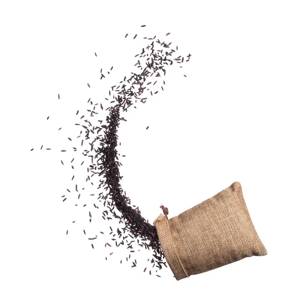 ベリー米爆発袋 黒紫色のベリー穀物の波の浮動小数点飛んで 空気中に落ちる ライスベリーは有機健康食品です 白の背景隔離された高速シャッター 凍結停止運動 — ストック写真
