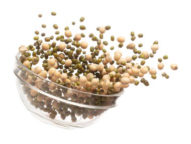 Mix green mung soy beans fall down explosion, several kind bean float explode in glass bowl. Dried soybean green mung mixed beans splash throwing in Air. White background Isolated high speed shutter